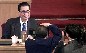 China's top legislator soft-pedals corruption issue